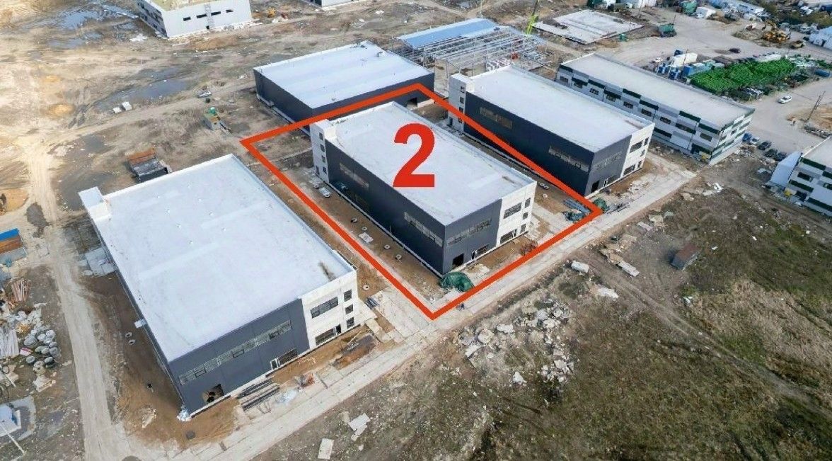 фасад дома, здание по адресу Ленинградская обл, Всеволожский р-н, тер Массив Порошкино, Промышленный пр-д, зд 21